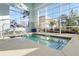 Relaxing hot tub with large windows overlooking the outdoors at 510 Eastern Isle Ave, Summerville, SC 29486