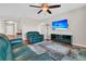 Spacious living room with green leather sofas and a large flat-screen TV at 510 Eastern Isle Ave, Summerville, SC 29486
