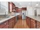 Modern kitchen with granite counters and wood cabinets at 510 Eastern Isle Ave, Summerville, SC 29486