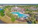 Aerial view of community pool, clubhouse, and surrounding neighborhood at 510 Eastern Isle Ave, Summerville, SC 29486