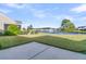 Spacious backyard with pond view, patio, and lush landscaping at 510 Eastern Isle Ave, Summerville, SC 29486