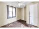 Small bedroom needing renovation, with damaged carpet and walls at 1860/1858 Taberwood Cir, Charleston, SC 29407