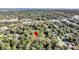 Aerial view showing house location near waterway and town at 1860/1858 Taberwood Cir, Charleston, SC 29407