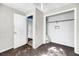 Bedroom with worn carpet, showing some wall damage and a closet with a door at 1860/1858 Taberwood Cir, Charleston, SC 29407