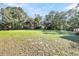 Large grassy backyard with mature trees at 1860/1858 Taberwood Cir, Charleston, SC 29407