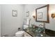 Elegant powder room with a vessel sink and marble countertop at 2588 High Hammock Rd, Johns Island, SC 29455