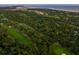 Aerial view showcasing a golf course community near the ocean at 2588 High Hammock Rd, Johns Island, SC 29455