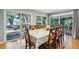 Elegant dining room with hardwood floors and access to a deck at 2588 High Hammock Rd, Johns Island, SC 29455