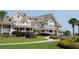 Large, two story home with wrap around porch and manicured lawn at 2588 High Hammock Rd, Johns Island, SC 29455