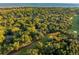 Aerial view of community with lush golf course and ocean views at 2588 High Hammock Rd, Johns Island, SC 29455