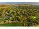 Aerial view of houses and golf course near the coast at 2588 High Hammock Rd, Johns Island, SC 29455