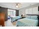 Bedroom with twin beds and barn doors leading to another room at 2588 High Hammock Rd, Johns Island, SC 29455