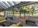 Spacious covered porch with golf course views at 2588 High Hammock Rd, Johns Island, SC 29455