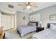 Bedroom with two twin beds, ceiling fan and window at 2588 High Hammock Rd, Johns Island, SC 29455