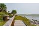 Boardwalk path with ocean views and seating area at 2588 High Hammock Rd, Johns Island, SC 29455