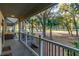 Relaxing porch overlooking a lush green golf course at 2588 High Hammock Rd, Johns Island, SC 29455