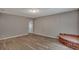 Spacious bedroom with hardwood floors and an adjacent door at 2674 Houston St, North Charleston, SC 29405