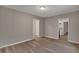 Spacious living area with light gray walls and wood floors at 2674 Houston St, North Charleston, SC 29405