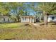 Charming bungalow home with a landscaped front yard at 2674 Houston St, North Charleston, SC 29405