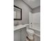 Clean bathroom with a vanity, toilet, and a tub shower combo at 2674 Houston St, North Charleston, SC 29405