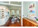 Bright living room with hardwood floors, built-ins and comfy seating at 55 Rialto Rd, Mount Pleasant, SC 29464