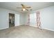 Bright bedroom with ceiling fan and view into kitchen at 298 Stefan Dr, Charleston, SC 29412