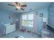 Charming Bedroom with butterfly decor and toys at 4966 Ballantine Drive, Summerville, SC 29485