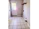 Simple laundry room with tile floor and exterior access at 211 Downing Dr, Summerville, SC 29485