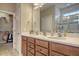 Double vanity bathroom with a large mirror and linen closet at 126 Harbor Trace Ln, Summerville, SC 29486