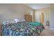 Spacious bedroom with floral bedding and a large dresser at 126 Harbor Trace Ln, Summerville, SC 29486