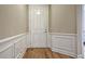 Light entryway with hardwood floors and wainscoting at 126 Harbor Trace Ln, Summerville, SC 29486
