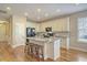 Modern kitchen featuring white cabinets, granite countertops, and an island at 126 Harbor Trace Ln, Summerville, SC 29486