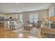 Open living space with hardwood floors and a view into the kitchen at 126 Harbor Trace Ln, Summerville, SC 29486