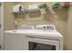 Laundry room with washer, dryer and shelving at 126 Harbor Trace Ln, Summerville, SC 29486