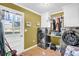 Laundry room with washer, dryer, and built-in storage at 203 Hickory Nut Drive, Harleyville, SC 29448