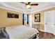 Bright main bedroom with hardwood floors and a ceiling fan at 203 Hickory Nut Drive, Harleyville, SC 29448