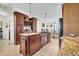 Kitchen with large island and granite countertops at 203 Hickory Nut Drive, Harleyville, SC 29448