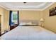 Large main bedroom with hardwood floors and neutral color palette at 203 Hickory Nut Drive, Harleyville, SC 29448