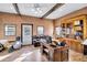Office with wood beams, desk, and large window at 203 Hickory Nut Drive, Harleyville, SC 29448