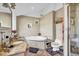 Elegant bathroom with corner jacuzzi tub, granite countertop, and neutral tile at 203 Hickory Nut Drive, Harleyville, SC 29448