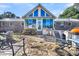 Outdoor patio with stone flooring and a built-in grill at 203 Hickory Nut Drive, Harleyville, SC 29448