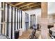 Unfinished garage area with gravel flooring, and space for bikes and cars at 681 Mclernon Trce, Johns Island, SC 29455