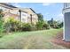Landscaped backyard with ample green space and privacy at 681 Mclernon Trce, Johns Island, SC 29455