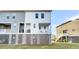 Townhouse exterior boasts a private backyard and exterior access to the garage at 681 Mclernon Trce, Johns Island, SC 29455