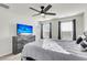 Main bedroom with large TV, dresser and window coverings at 681 Mclernon Trce, Johns Island, SC 29455