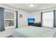 Cozy bedroom with a double bed, TV, and window coverings at 681 Mclernon Trce, Johns Island, SC 29455