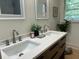 Modern bathroom with double vanity and updated fixtures at 2026 Culver Ave, Charleston, SC 29407