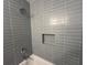 Bathroom with gray tile and a built-in shower niche at 2026 Culver Ave, Charleston, SC 29407