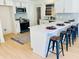 Modern kitchen with white cabinets, quartz countertops, and stainless steel appliances at 2026 Culver Ave, Charleston, SC 29407