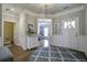 Bright and spacious entryway with hardwood floors and access to powder room at 119 Camelia Park Ln, Summerville, SC 29486